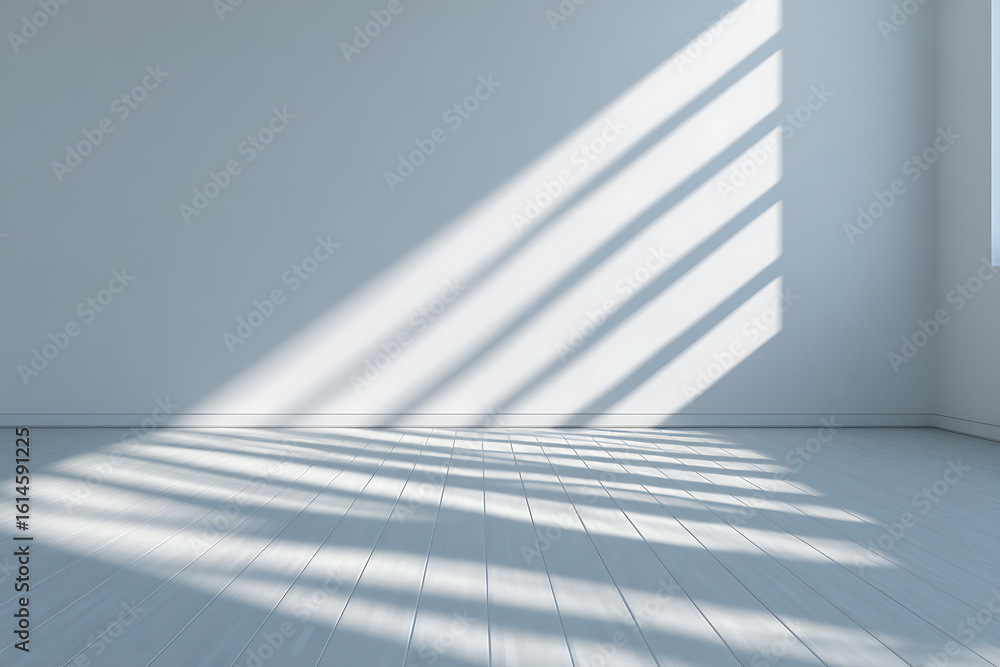 Poster sunlight streaming through blinds creates a geometric pattern of light and shadow on a clean white w