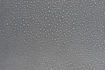 Water drops on the gray  fabric, horizontal