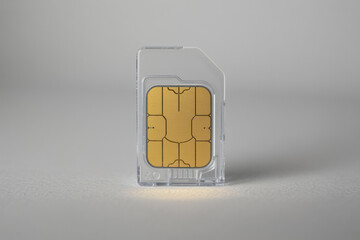 Transparent SIM Card on White Background Showcasing Modern Mobile Communication Technology