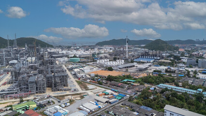 Oil refinery industry at sunset - factory - petrochemical plant