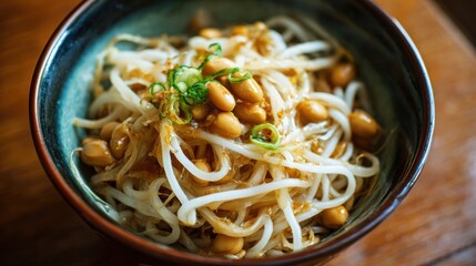 Fresh bean sprouts topped with roasted peanuts create a flavorful dish. This meal is served in a rustic bowl, highlighting the simplicity and charm of the restaurant's ambiance during lunch hours.