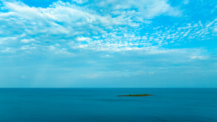 Nature of the ocean and blue sky Summer with sunshine, sandy beaches, clear blue waters sparkling...