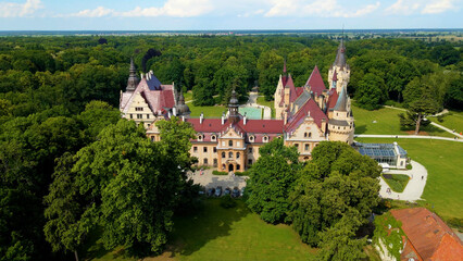Moszna Castle fly over landscape view from above architecture near the village Moszna Poland
