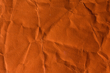 Orange crinkle paper background.