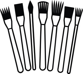 Collection of art brushes in silhouette