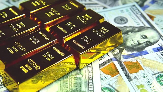 Paper us 100 dollar bill with gold bars, concept of investment and saving, wealth