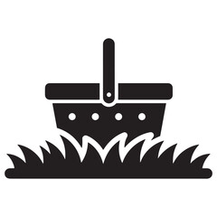 Obraz premium Simple black picnic basket on green grass outdoors icon illustration