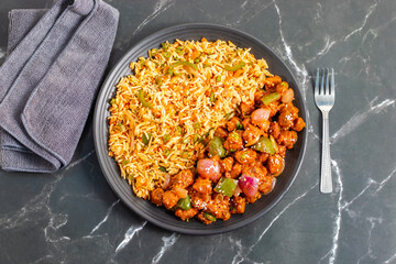 Soya Manchurian served with fried rice is a delicious, protein-rich Indo-Chinese combo featuring...