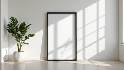 Minimalist Room with Empty Frame and Potted Plant in Bright Natural Light