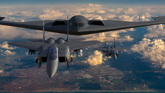 B-2 Spirit bomber escorted by an F-15