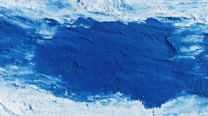 Bright blue paint creates a striking contrast against the white background, showcasing an abstract texture. This visual evokes creativity and modern design.