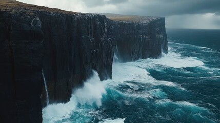 Dramatic coastline with powerful ocean waves crashing against steep cliffs