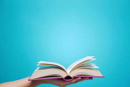 Open book in hand on blue background. 3d rendering. - Powered by Adobe