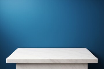 White marble table surface in front of a smooth blue wall background with clean lighting and blank copy space for design or product display.