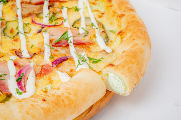 Savor the mouthwatering flavors of a freshly baked pizza topped with meats, veggies, and herbs