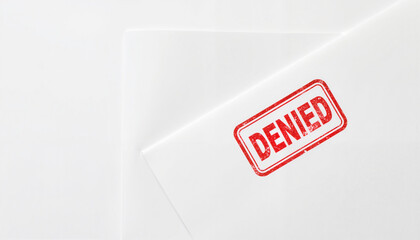 Official paperwork marked "Denied" in minimalistic setting, bureaucratic aspect