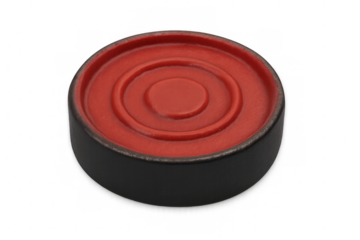 Red and black checker piece on transparent background