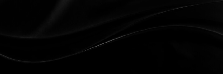 Black gray satin dark fabric texture luxurious shiny that is abstract silk cloth panorama background with patterns soft waves blur beautiful.