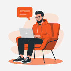Man with beard and glasses sitting in orange chair using a laptop with a speech bubble above him