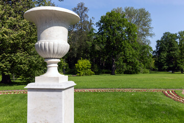Elegant Marble Vase in a Serene Sunny Park Setting