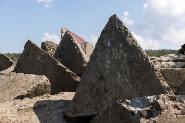 Close-Up Shot of Geometric Concrete Shapes Against Blue Sky