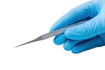 Close-up of a hand in a blue glove holding a metal tool