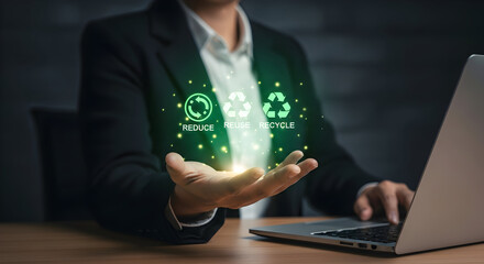 Person holds recycle icons while working, concept for sustainable solutions at the office