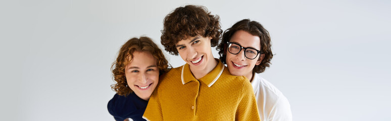 Stylish young friends enjoying a fun moment together in a cheerful, bright setting