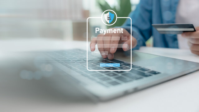 Close-up of a person entering credit card information on a secure online payment form. Concept of digital transaction, e-commerce, fintech security, online shopping, and mobile banking safety.