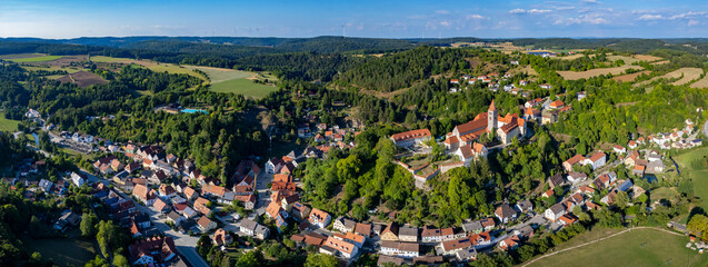 Aerial panoramic view around the old town of the city Kastl on a sunny spring noon in Germany.