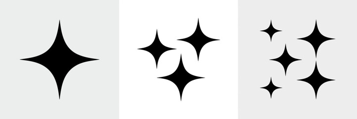 Obraz premium Sparkling Star Shapes in a Minimalist Design Aesthetic Set Against Light Gray and White Backgrounds