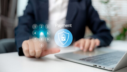 Close-up of user entering a PIN code on virtual keypad to confirm secure online payment. Concept of...