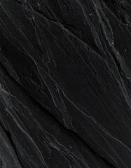 Dark, textured stone surface with diagonal striations and subtle variations in shade