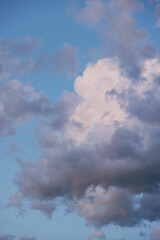 Fluffy Clouds at Dusk in the Summer Sky