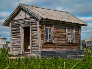 abandoned old wooden house in a northern village in Russia