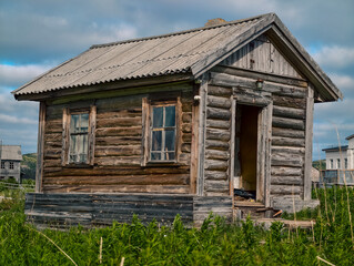 abandoned old wooden house in a northern village in Russia