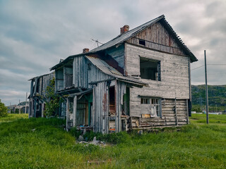 abandoned old wooden house in a northern village in Russia