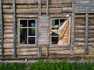 abandoned old wooden house in a northern village in Russia