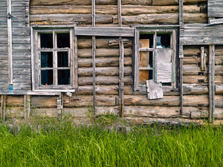 abandoned old wooden house in a northern village in Russia