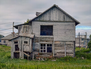 abandoned old wooden house in a northern village in Russia
