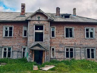 abandoned old wooden house in a northern village in Russia