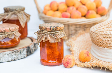 Preservation and summer harvest. Homemade healthy jelly, apricot jam. Preparing jars. Sweets and fruits.