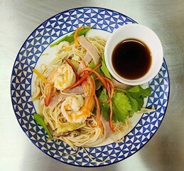 Stir-fried Noodles with Shrimp, Pork, and Vegetables on Decorative Plate