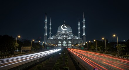Obraz premium Majestic Night View of Sultan Ahmad Shah Mosque with Traffic Trails