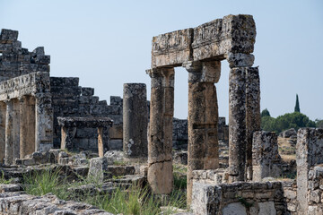 Explore Ancient Ruins of Pamukkale With Stunning Columns and Stone Structures Underneath a Clear...