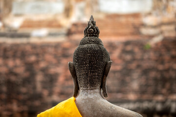 Sculpture of a Buddha with his back turned at the Reclining Buddha Temple, Wat Yai Chai Mongkhon,...
