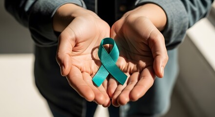 Hands Gently Cupping Teal Awareness Ribbon, Representing Cancer Support and Public Health Initiatives
