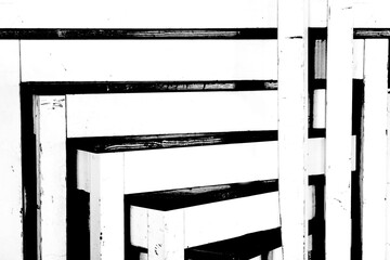 Black and white layer wood tables stack background.
