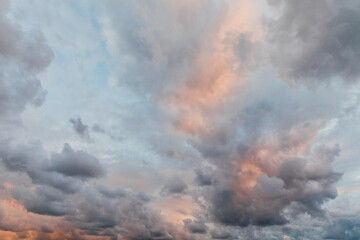 gray red sunset sky with clouds