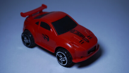 Fototapeta premium red toy car on a white background